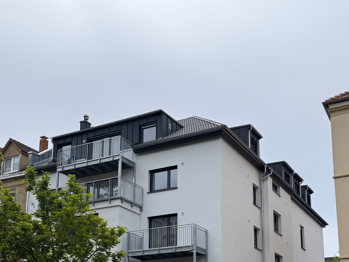 Fassade & Dachausbau — saniert von WBD